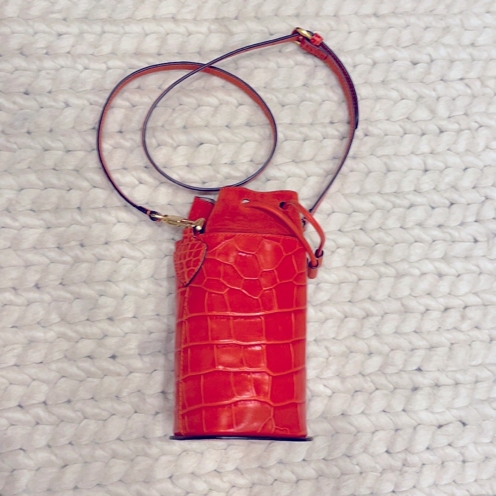 Dissona orange cylinder/ bucket bag